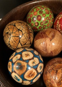 lot 109 image: Decorative Hand Carved African Bowl with Colorful Spheres