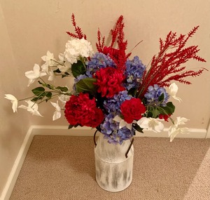 lot 160 image: Beautiful Floral Arrangement in a Decorative White Metal Milk Can Style Vase