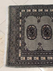 lot 80 image: Small Bokhara Wool Accent Rug
