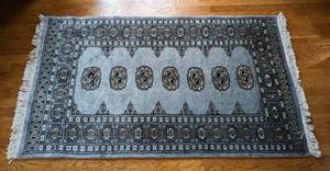 lot 10 image: Blue Bokhara Wool Accent Rug