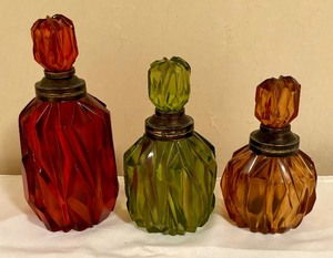 lot 110 image: Three Colorful Decorative Bottles