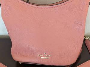 lot 32 image: Kate Spade Small Pink Leather Crossbody Bag