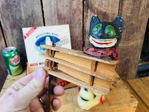 lot 31 image: Vintage WoodPaper Mache Halloween Noise Maker & Skull