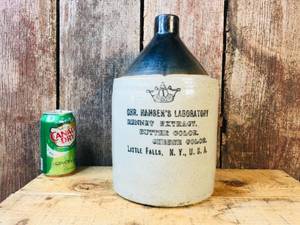lot 34 image: Vintage Crown Pottery 1 Gallon Advertiser Crock Jug