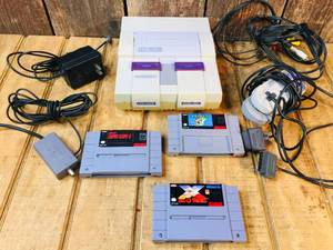 lot 13 image: Vintage Nintendo SNES with Games - Cords - Controllers