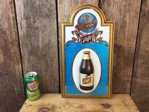 lot 135 image: Vintage Schlitz Bottle Sign