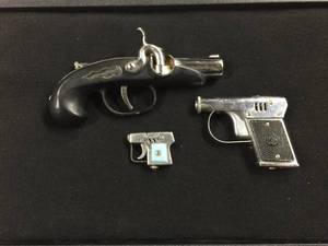 lot 258 image: 3 Vintage Pistol Lighters