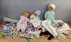 lot 73 image: (3) Toy Dolls with ClothesAccessories & Blankets, and (4) American Girl Books (Kit and Kirsten) D