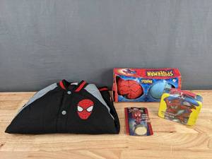 lot 104 image: An Assortment of Spiderman Toys and Accessories K