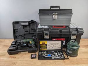 lot 76A image: Quantum Pro Drill with Case, Socket Set, Coleman Lantern, Tool Boxes and More   Z