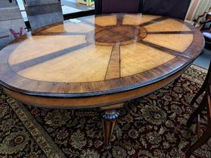lot 768 image: E.J. Victor Rosewood & Satin English Regency Dining Table Set - Table, (3) Chippendale Leather Seat Side Chairs, (4) Chippendale Leather Seat Arm Chairs, (3) Leaves, Protective Table Pads