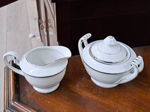 lot 1140 image: Silver Melody Fine China Creamer and Covered Sugar Bowl