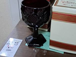 lot 1194 image: Lot of (4) Avon 1876 Cape Cod Collection Red Glass Water Goblet with Candles