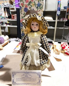 lot 1052 image: The Wimbledon Collection Porcelain Doll with Certificate of Authentication
