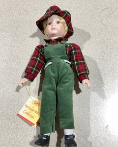 lot 1080 image: Heritage Mint Collection Porcelain Boy Doll