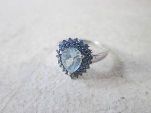 lot 314 image: (CNTR) 925 China Silver Ring with Several Small Blue Stones and Large Light Blue Center Stone Size 7