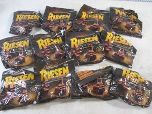lot 104 image: (B-1) 12 Bags Riesen Candy Past Date