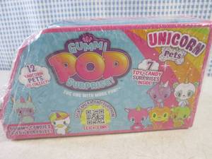 lot 107 image: (C-3) Display of 7 Gummi Pop Surprise with Unicorn Pets Past Date