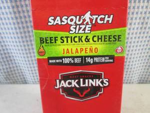 lot 173 image: (B-2) Box of 12 Jack Links Sasquatch Size Jalapeno Beef Stick & Cheese Best by Nov 2023