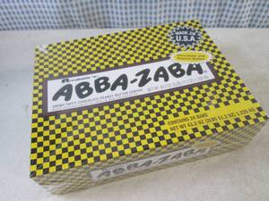 lot 201 image: (C-1) Box of 24 Abba-Zaba Chewy Taffy with Chocolate Peanut Butter Center Candy Bars Best by Oct 2023
