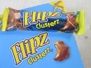 lot 206 image: (C-2) Box of 24 Flipz Clusterz Candy Bars Past Date