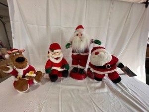 Variety of Plush Santas