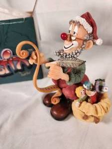 Slapstix Santa Clown Checking His List