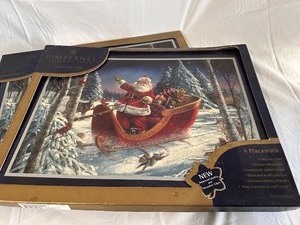 Set of 8 Heat Resistant Santa Placemats and Set of 4 Coasters New in Boxes