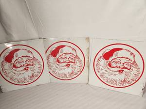 Three Vintage Metal Santa Signs