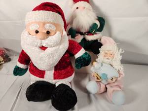 Variety of Plush Santas