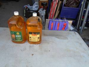 Qty of 2 gallons of Tiki torch oil. As shown.