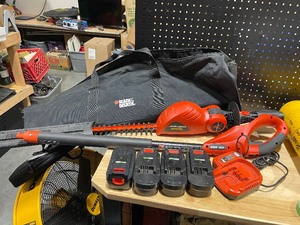 lot 51 image: Black & Decker Cordless Pole Hedge Trimmer
