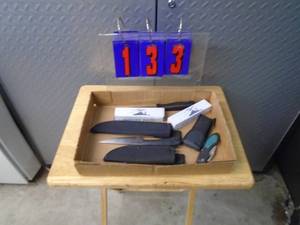 Flat of knives, as shown & cord steel misc. As shown.