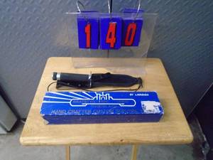 Yugoslauvian survival knife. As shown.