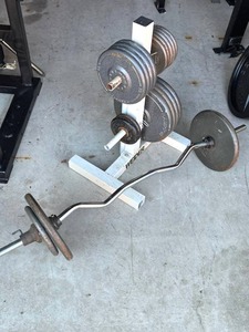 lot 26 image: Vintage Weider Plate Rack with Curl Bar and Assorted Weights