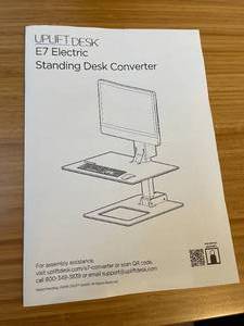 lot 103 image: UPLIFT Desk E7 Electric Standing Desk Converter with LG Monitor