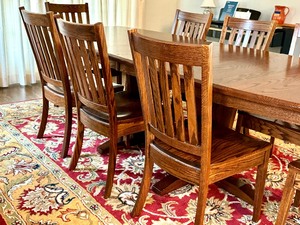 lot 16 image: Simply Amish Dining Room Table and Eight Chairs