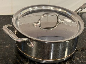 lot 219 image: All Clad Three Quart Saucepan