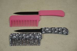 lot 35 image: 2 Hair Comb Knives