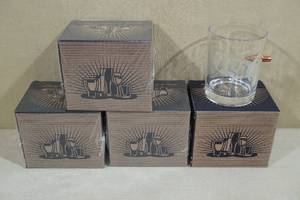 lot 64 image: 4 Lucky Shot Whiskey Glasses with Embedded Bullet