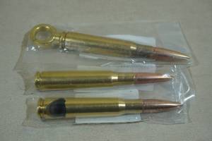 lot 85 image: 50 Cal BMG Bottle Opener, Corkscrew, and Tap Handle