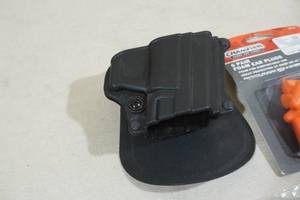lot 89A image: Paddle Pistol Holster with Earplugs