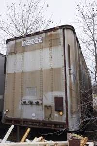 lot 4 image: 1970 Strickland 39 Foot Semi Trailer with 2 Rolling Shelves