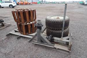 lot 897 image: Loegering Half Track System for JLG 600S Aerial Boom Lift