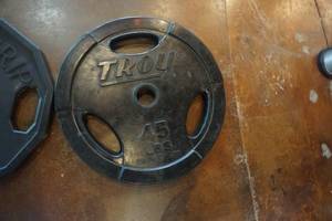 lot 101 image: 1 Troy and 1 Rogue Hi Temp 45 lb Weight Plates