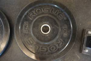 lot 127 image: 2 - Rogue Fitness 15 lb Weight Plates