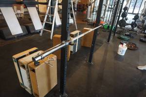 lot 290 image: Olympic Style Barbell With Clamps 87 Length