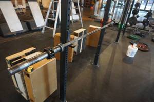 lot 304 image: Rogue Fitness Olympic Style Barbell With Clamps 87 Length