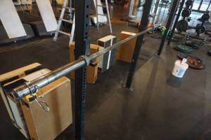 lot 305 image: Olympic Style Barbell With Clamps 87 Length