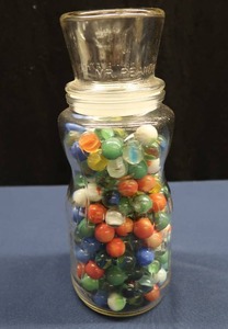 lot 47 image: LOT OF VINTAGE MARBLES IN A MR PEANUT COLLECTIBLE JAR